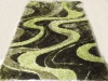 green shaggy shinny rug