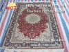 hand knotted persian rug with silk inserts