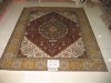 handknotted persian silk rug