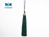 hanging green long tassel with material tag