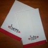 kitchen towel with embroidery and red edge