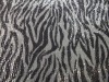 knitted fabric on animal print sequin embroidery