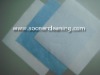 low lint woodpulp nonwoven fabric