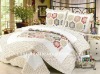 patchwork and printed bedspreads