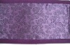 purple hotel bed tail towel