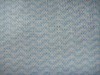 raised grain nonwoven fabric