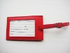 red leather luggage tag