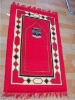 red muslim prayer rug