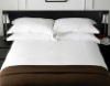 simple plain white hotel bed linen