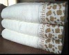 solid bath towel with jacquard border