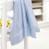 solid cotton terry hand towel with satin-border