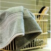 solid cotton terry hand towel with satin- border