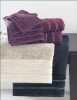 solid dyed satin-border bath towel