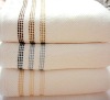 terry baths towels with colored satin border