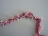 twisted knitting yarn pig tail with feather