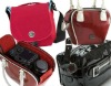 various red leather camera bag