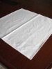 white 100% cotton airline table napkin with lattice border