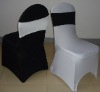 white and black spandex chair cover and band for wedding