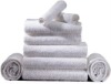 white cotton bath hotel towel