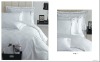 white cotton bed linens