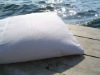 white cotton fabric hotel pillow