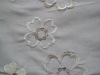 white embroidered fabric