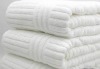 white terry hotel bath towel
