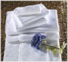 white terry hotel towel