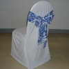 white wrinkle free stretch scuba chair covers with royal blue flocking taffeta sash