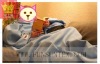 women snuggle blanket